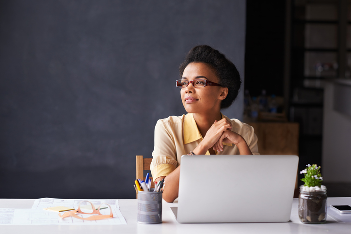 Cropped shot of a young businesswoman working on her laptop in the office